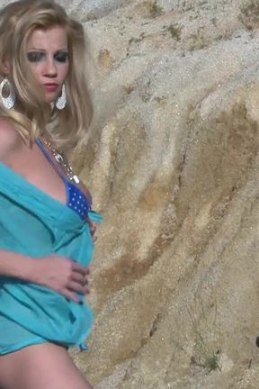 Sexy blonde shows off her hot body outdoor