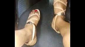Pretty red toes in sandals