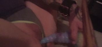 Anal training with toys and dildos, whilst legs restrained and tied back over head.