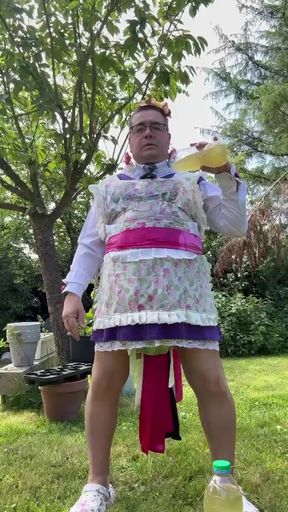 In gardener's clothes to take a piss shower outside fully dressed