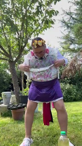 In gardener's clothes to take a piss shower outside fully dressed