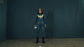 Batgirl and the Riddler, locked in a vacuum bed and tied up