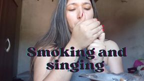 Lola sings while smoking her cigarette
