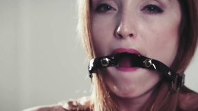 Nipple clamps & ball gag make a horny redhead cum hard