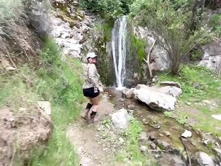Pissing in a waterfall