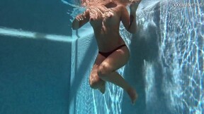 Enjoys her sweet sexy body in the pool her name Puzan Bruhova