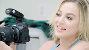 Handsome guy and busty girl in photo shoot