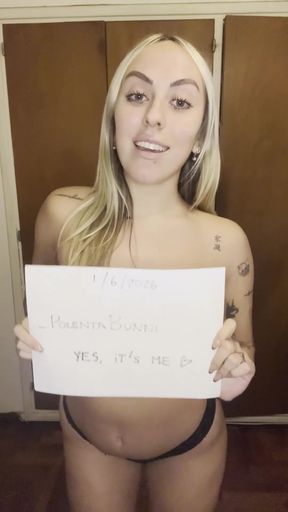 Slim Latina blonde takes a selfie in her professional studio