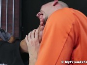 Uniformed prison guard foot worshipped by bald gay inmate