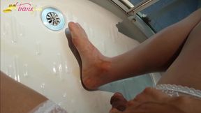 Sexy tranny in white stockings pissing on feet and cumshot video
