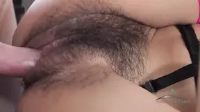 Asian girl's hairy pussy filled with black cum