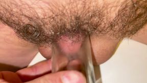 Tiny cock in spice jar