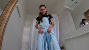 Desperate peeing in jeans overalls