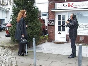 Classy brunette interviewed on the street in vintage german video