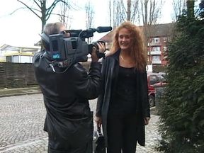 Classy brunette interviewed on the street in vintage german video