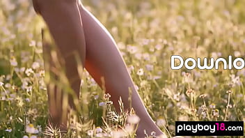 Petite Filipina Kit Rysha stripping and posing nude at a wildflower field
