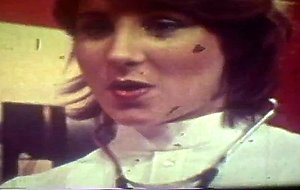 Horny doctor banging his nurse in vintage porno scene