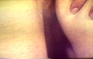 Horny doctor banging his nurse in vintage porno scene