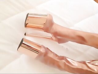 Gold knee high boots, fishnet nylons, micro petticoat and a white mini top