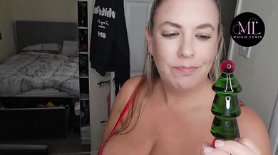 Milf stretches tight pussy with glass dildo till she gushes