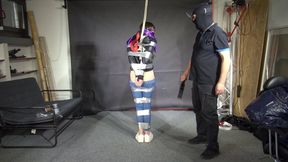 Poor Marie bound and gagged in a shiny nylon Windbreaker