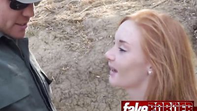 Redhead cutie pleasuring stiff boner outdoors on the border