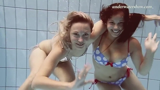 Iva and Paulinka enjoy swimming together