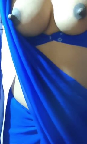 Busty desi Indian shows off her big tits and nipples