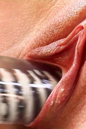 Blonde fingers her holes then fucks with a long dildo