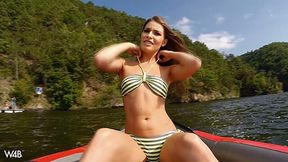 Zena Little plays with her pussy and pisses in the middle of lake on a boat