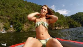 Zena Little plays with her pussy and pisses in the middle of lake on a boat