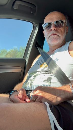 Daddy wanking un his car
