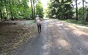 Hot blonde babe fists and masturbates in the woods