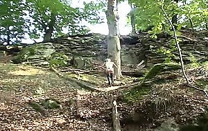 Hot blonde babe fists and masturbates in the woods