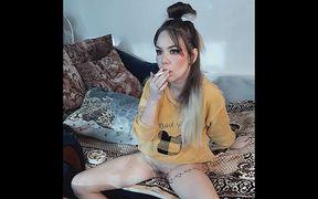 Stepsister without panties smokes a cigarette