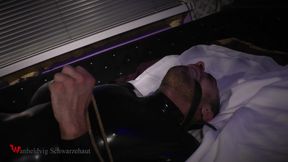 Roped in Latex: Zeus Struggles to Break Free