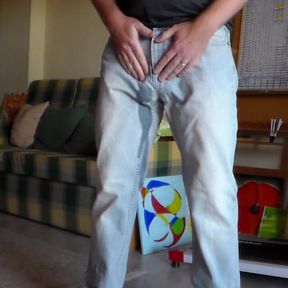 John is peeing in his jeans