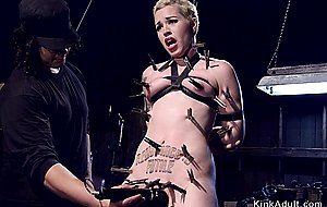 Blonde in device bondage tormented