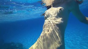 Russian girl with a hot body enjoys skinny dipping and looks HOT