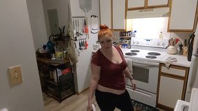 unaware housewife cleans kitchen with buttcrack exposed