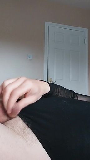 Key moment from "Plugged, tiny-clit sissy cums in leotard, tights &amp; heels"