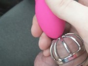 Teasing my locked clit in the car