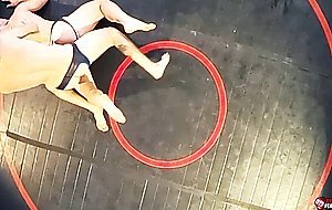 Hung jock Shane Cook begins his near naked wrestling match