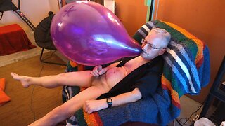 Popping daddy balloonbangers inflated large round balloon