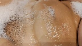 Tanned big tits stepsister in bathroom playing with pussy and tits