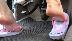 Zuzana's feet and flip flops pumping pedals (MOBILE)