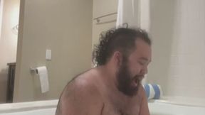 Fat Guy Relaxes in a Tub