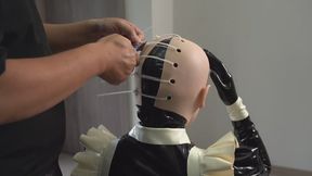 Expressionless latex maid