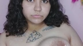 Putting a dildo between my breasts with cream