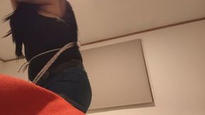 Crossdresser long hair bound and gagged in denin shorts, hogtied.
